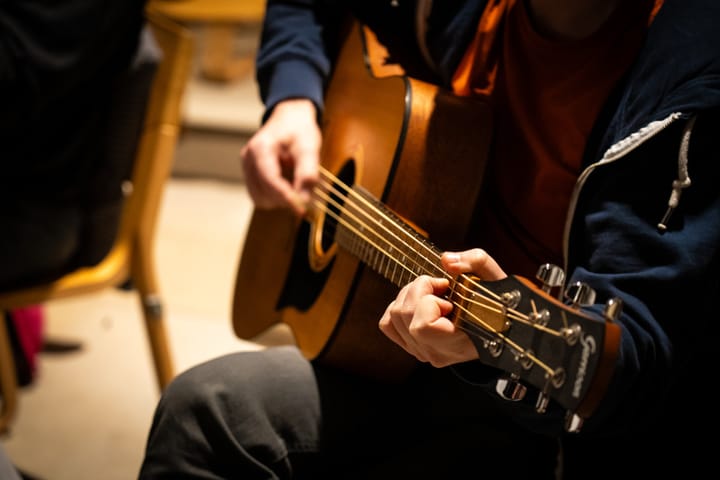 Ben Siddall teaching a guitar lesson in Ilkley